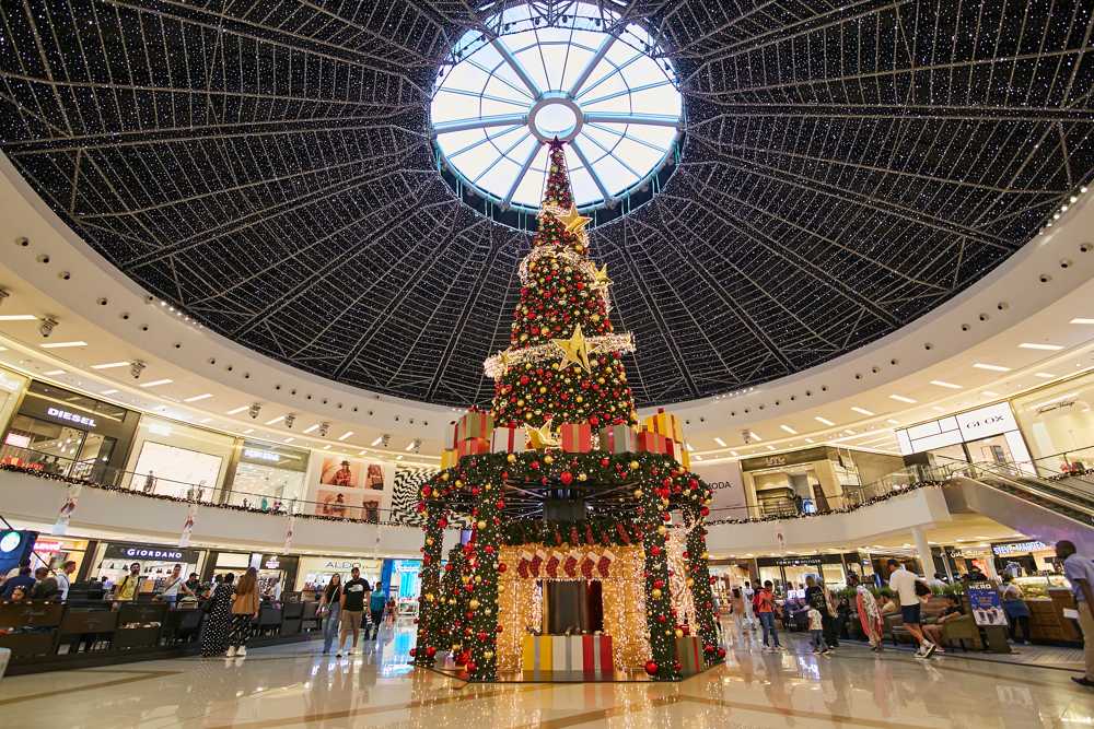 Christmas tree installed by Redfox under the glass dome of Dubai Marina Mall, Dubai