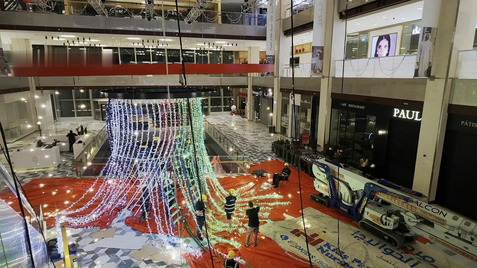 Illuminated suspended structure rigged by Redfox above the central atrium of The Galleria Mall, Abu Dhabi