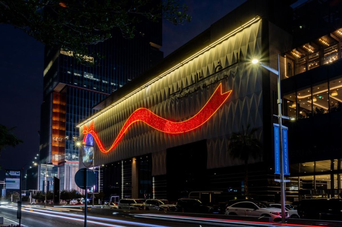Illuminated red ribbon installed by Redfox across the facade of The Galleria Mall, Abu Dhabi